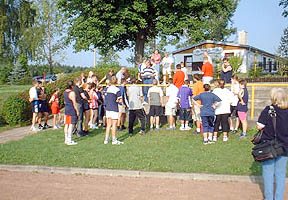 Frau Streek schiet ein Gruppenfoto